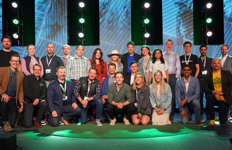 Cultivator's Agtech Accelerator Cohort 1 pose on stage for a photo.